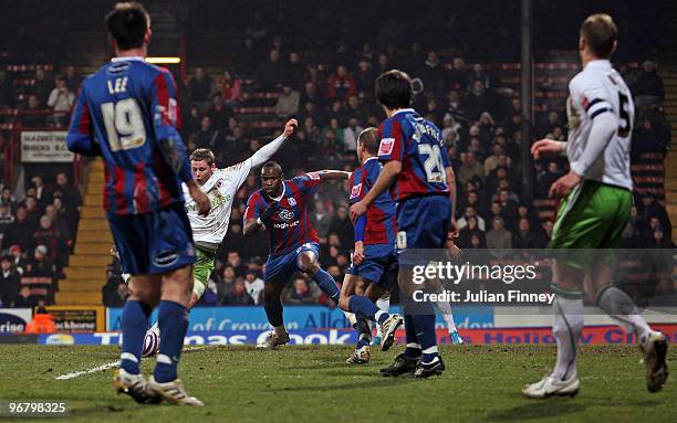Simon Church of Reading scores his team's third goal during the Coca-Cola Championship match between Crystal Palace and Reading at Selhurst Park on...