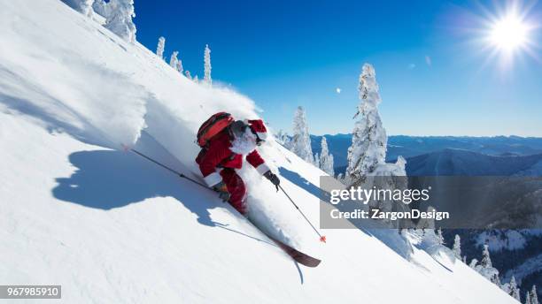 powder skiing - skiing mountain stock pictures, royalty-free photos & images