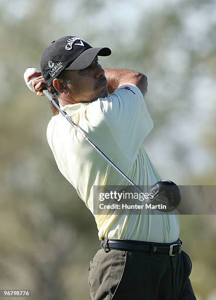 Jeev Milkha Singh of India tees off on the fourth hole during round one of the Accenture Match Play Championship at the Ritz-Carlton Golf Club on...