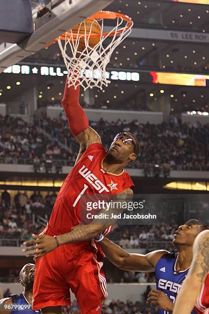 Amar'e Stoudemire of the Western Conference shoots against Dwight Howard of the Eastern Conference during the second half of the NBA All-Star Game,...