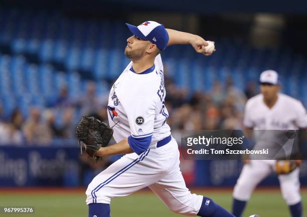 Marco Estrada of the Toronto Blue Jays delivers a pitch in the first inning during MLB game action against the New York Yankees at Rogers Centre on...