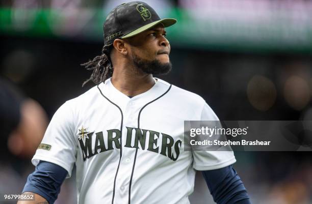 Relief pitcher Alex Colome of the Seattle Mariners walks off the field during a game against the Texas Rangers at Safeco Field on May 28, 2018 in...