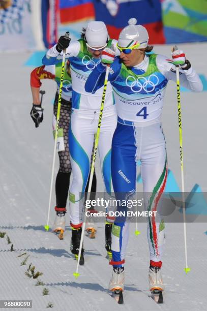 Italy's Magda Genuin leads Slovakia's Katja Visnar and Sweden's Hanna Falk as they compete in the women's Nordic Cross Country individual sprint...