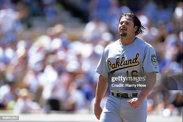 Jason Giambi of the Oakland Athletics walks back to the dugout during their interleague MLB game against the Los Angeles Dodgers at Dodgers Stadium...