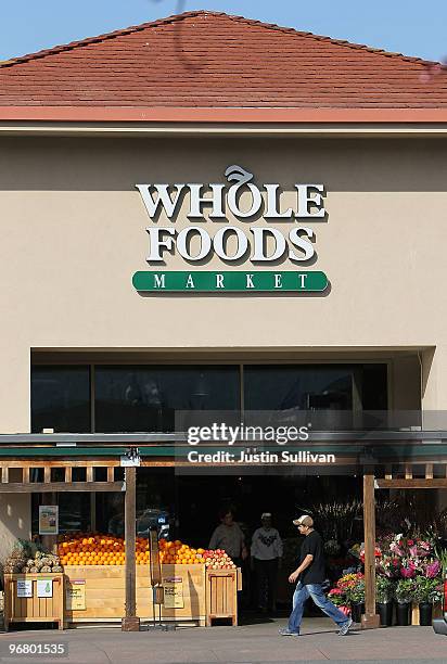 An customer walks by the entrance to a Whole Foods store February 17, 2010 in San Rafael, California. Whole Foods Market reported a 79 percent surge...