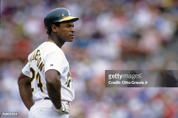 Rickey Henderson of the Oakland Athletics looks on during their MLB game against the Toronto Blue Jays at Oakland-Alameda County Coliseum on May 30,...