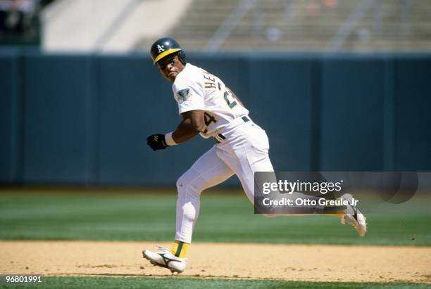 Rickey Henderson of the Oakland Athletics runs the bases during their MLB game against the Boston Red Sox at Oakland-Alameda County Coliseum on April...