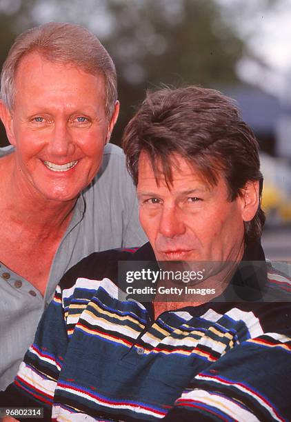 Roland Rocchiccioli and former Geelong Cat AFL player Sam Newman pose during a portrait shoot.