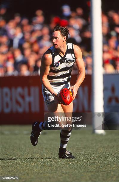 Ben Graham of the Cats prepares to kick during the round 19 AFL match between Geelong Cats and Essendon Bombers, 1997 in Melbourne, Australia.
