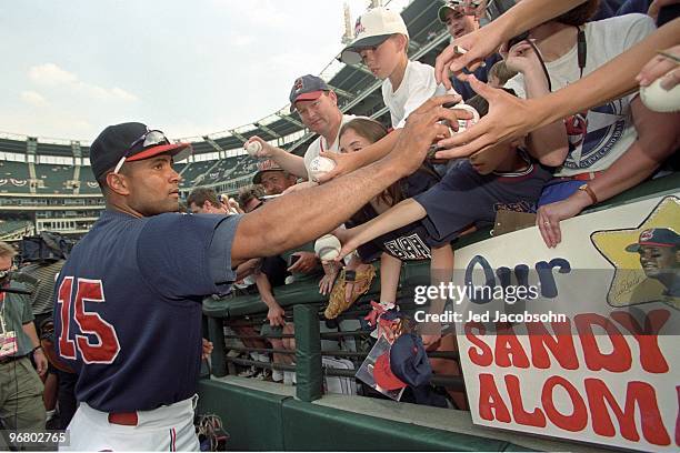 Sandy Alomar Jr. Signs autographs for fans before the 1997 MLB All-Star Game on July 8, 1997 at Jacobs Field in Cleveland, Ohio.