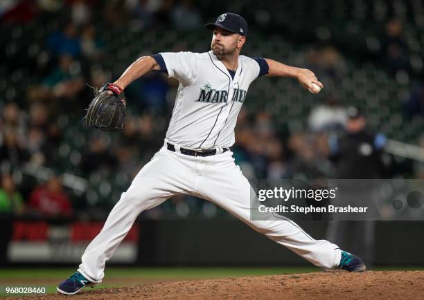 Reliever Marc Rzepczynski of the Seattle Mariners delivers a pitch during a game against the Texas Rangers at Safeco Field on May 29, 2018 in...