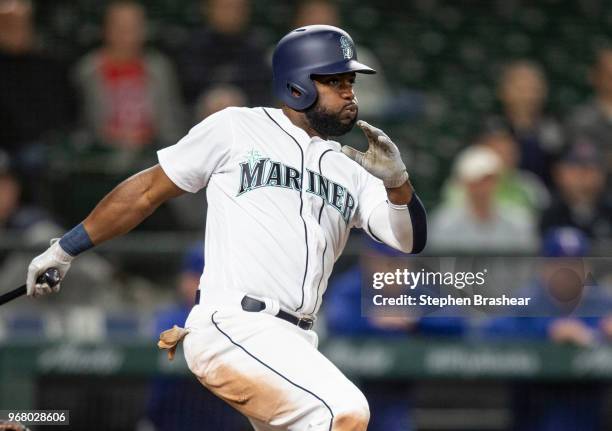 Denard Span of the Seattle Mariners takes a swing during an at-bat in a game against the Texas Rangers at Safeco Field on May 29, 2018 in Seattle,...