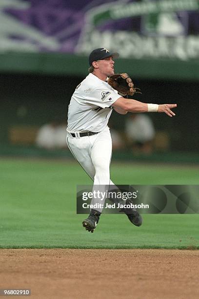 Craig Biggio throws during the 69th MLB All-Star Game at Coors Field on July 7, 1998 in Denver, Colorado.