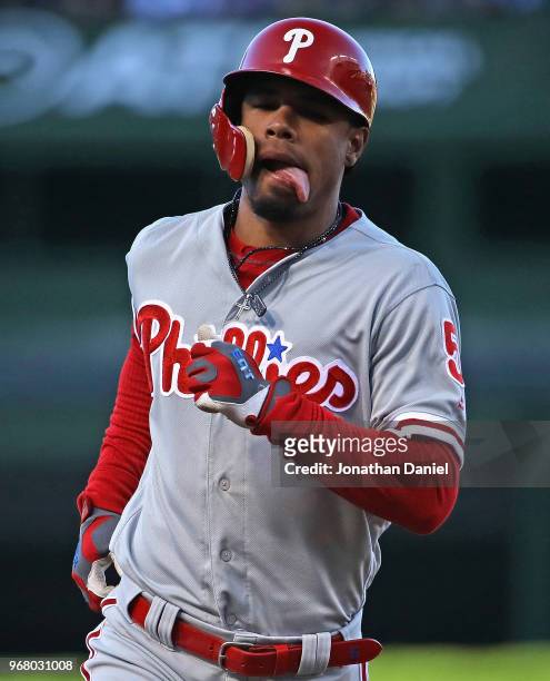 Nick Williams of the Philadelphia Phillies runs the bases after hitting a two run home run in the 2nd inning against the Chicago Cubs at Wrigley...