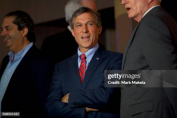 Delaware Governor John Carney arrives to address the media before placing the first bet at Dover Downs Casino on June 5, 2018 in Dover, Delaware....