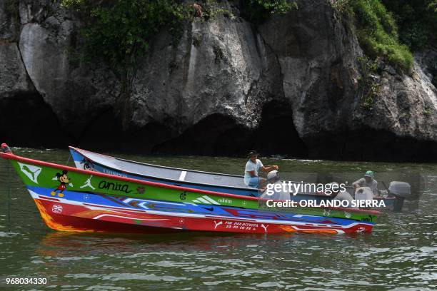 Fishermen drive their boats in the Gulf of Fonseca off the Pacific coast of Honduras, 100 km south of Tegucigalpa, on May 27, 2018. - The government...