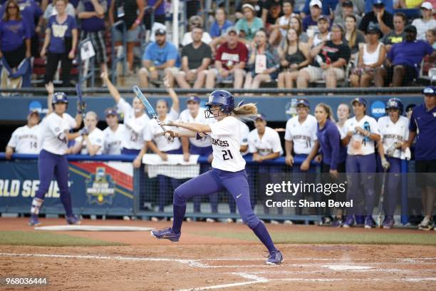 Kelly Burdick of the Washington Huskies hits against the Florida State Seminoles during the Division I Women's Softball Championship held at USA...