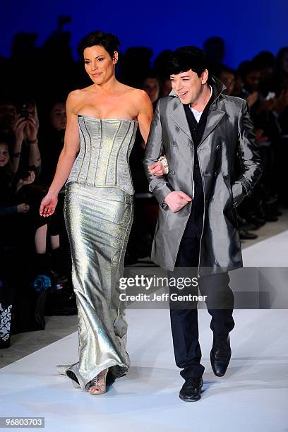 Countess LuAnn de Lesseps and Malan Breton walk the runway at the Malan Breton Fall/ Winter 2010 fashion show at Style360 on February 17, 2010 in New...