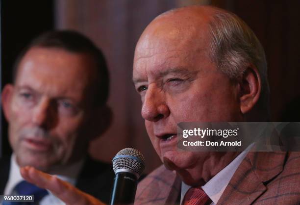 Tony Abbott looks on as Alan Jones makes a point at the launch of Kevin Donnelly's book 'How Political Correctness is Destroying Australia' on June...