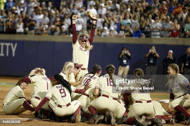 Carsyn Gordon of the Florida State Seminoles celebrates with her teammates after defeating the Washington Huskies during the Division I Women's...