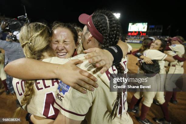 The Florida State Seminoles celebrate after defeating the Washington Huskies during the Division I Women's Softball Championship held at USA Softball...