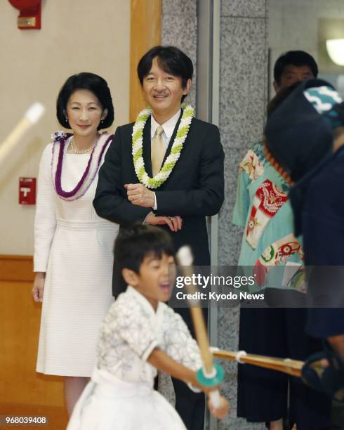 Japanese Prince Akishino and his wife Princess Kiko look in on a kendo Japanese martial art lesson at the Japanese Cultural Center of Hawaii in...