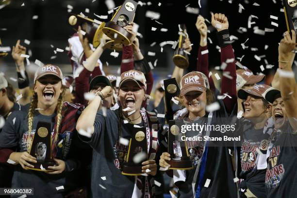 The Florida State Seminoles celebrate after defeating the Washington Huskies during the Division I Women's Softball Championship held at USA Softball...