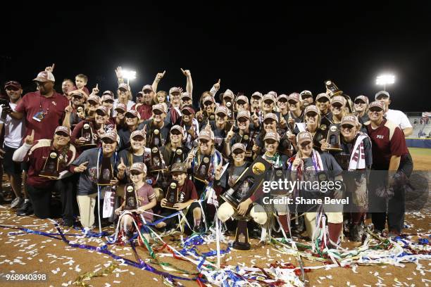 The Florida State Seminoles celebrate after defeating the Washington Huskies during the Division I Women's Softball Championship held at USA Softball...