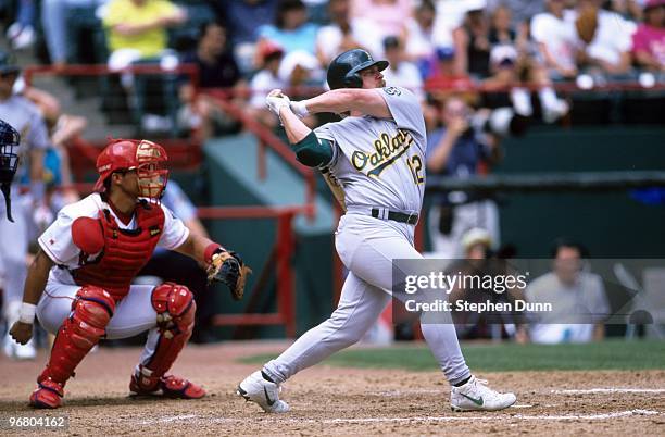 Matt Stairs of the Oakland Athletics bats during an MLB game against the Texas Rangers at The Ballpark in Arlington on June 18, 1998 in Arlington,...