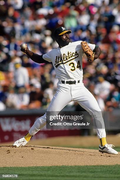 S: Dave Stewart of the Oakland Athletics pitches during an MLB game circa 1990's at Oakland-Alameda County Coliseum in Oakland, California.