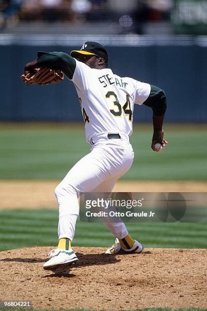 Dave Stewart of the Oakland Athletics pitches during an MLB game against the Seattle Mariners on June 24, 1992 at Oakland-Alameda County Coliseum in...