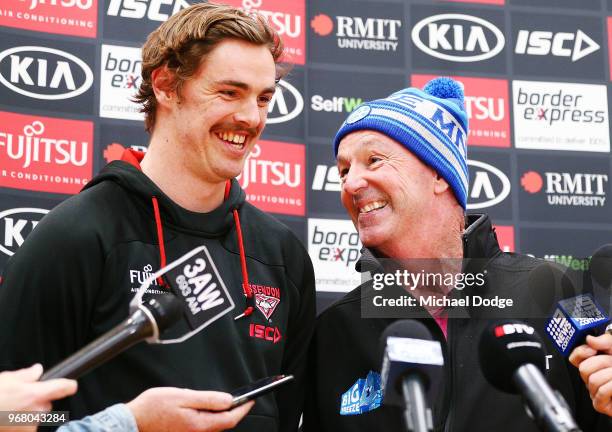 Legend Neale Daniher and Joe Daniher of the Bombers speak to media during an Essendon Bombers AFL media opportunity at The Hangar on June 6, 2018 in...