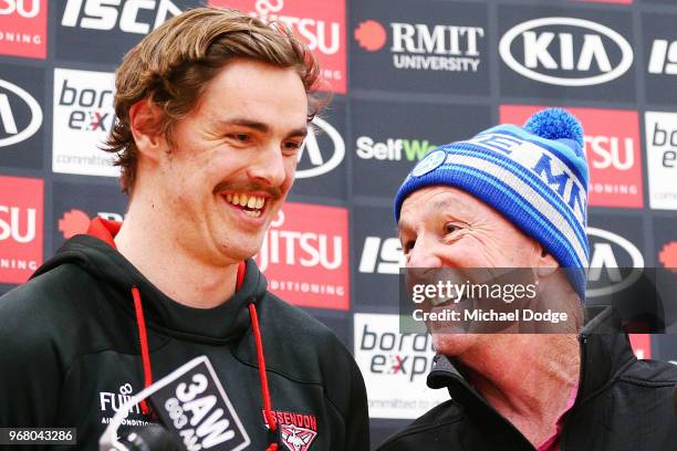 Legend Neale Daniher and Joe Daniher of the Bombers speak to media during an Essendon Bombers AFL media opportunity at The Hangar on June 6, 2018 in...