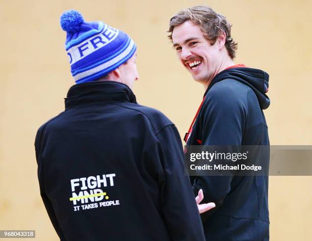 Legend Neale Daniher and Joe Daniher of the Bombers arrive to speak to media during an Essendon Bombers AFL media opportunity at The Hangar on June...