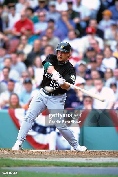 Matt Stairs of the Oakland Athletics bats during their MLB game against the Boston Red Sox at Fenway Park on April 15, 2000 in Boston, Massachusetts.