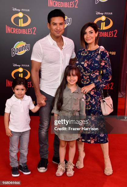 Dominic Lopez, Mario Lopez, Gia Francesca Lopez, and Courtney Laine Mazza attend the premiere of Disney and Pixar's "Incredibles 2" at the El Capitan...