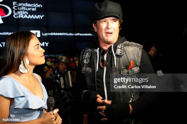 Carlos Vives and Nicolle Horbath seen during the Latin GRAMMY Cultural Foundation's Scholarship Presentation on June 5, 2018 in Bogota, Colombia.
