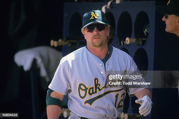 Matt Stairs of the Oakland Athletics looks on from the dugout during their MLB game against the San Diego Padres at Qualcomm Stadium on June 10, 1999...