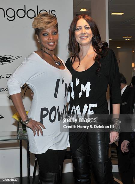 Singer Mary J Blige and designer Catherine Malandrino attend the debut of the limited-edition FFAWN & Catherine Malandrino t-shirt collection at...