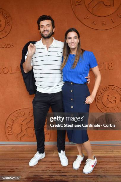 Journalist Antoine Benneteau and actress Charlotte Gabris attend the 2018 French Open - Day Ten at Roland Garros on June 5, 2018 in Paris, France.