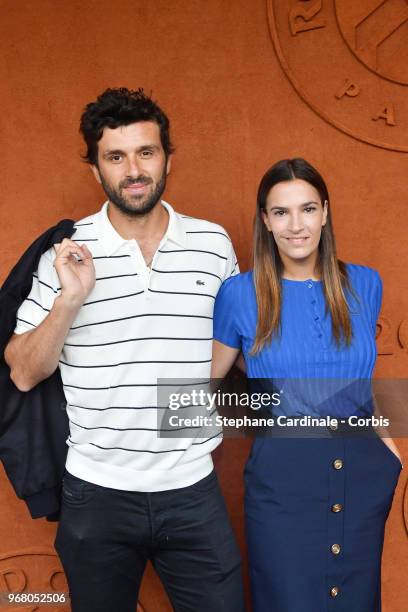 Journalist Antoine Benneteau and actress Charlotte Gabris attend the 2018 French Open - Day Ten at Roland Garros on June 5, 2018 in Paris, France.