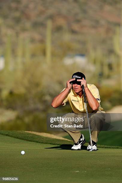 Steve Stricker checks his putt at the first play-off hole during the first round of the World Golf Championships-Accenture Match Play Championship at...