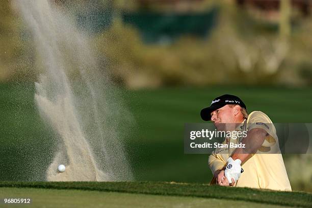 Steve Stricker hits out of the bunker at the first play-off hole during the first round of the World Golf Championships-Accenture Match Play...