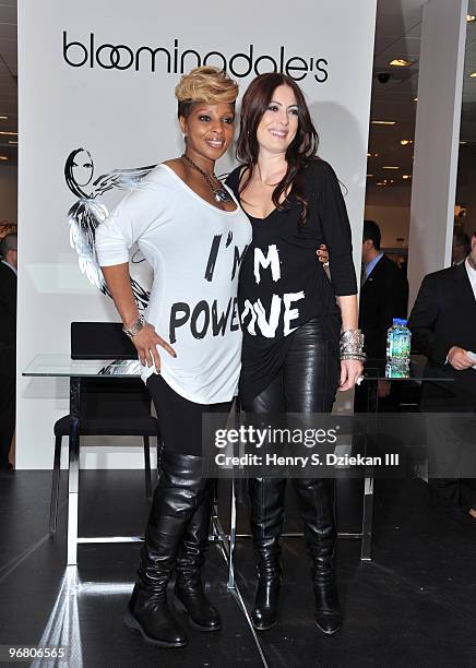 Singer Mary J Blige and designer Catherine Malandrino attend the debut of the limited-edition FFAWN & Catherine Malandrino t-shirt collection at...