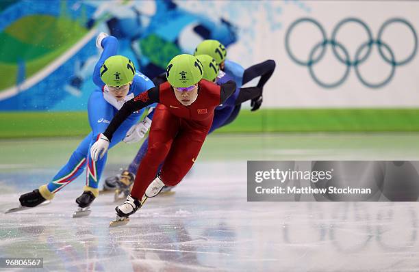 Zhou Yang of China leads Arianna Fontana of Italy and others in the Short Track Speed Skating Ladies' 500 m on day 6 of the Vancouver 2010 Winter...