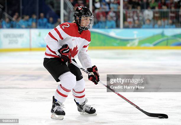 Meghan Agosta of Canada controls the puck during the ice hockey women's preliminary game between Canada and Sweden on day 6 of the 2010 Winter...