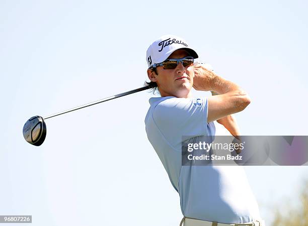 Michael Sim of Australia hits a drive from the second tee box during the first round of the World Golf Championships-Accenture Match Play...