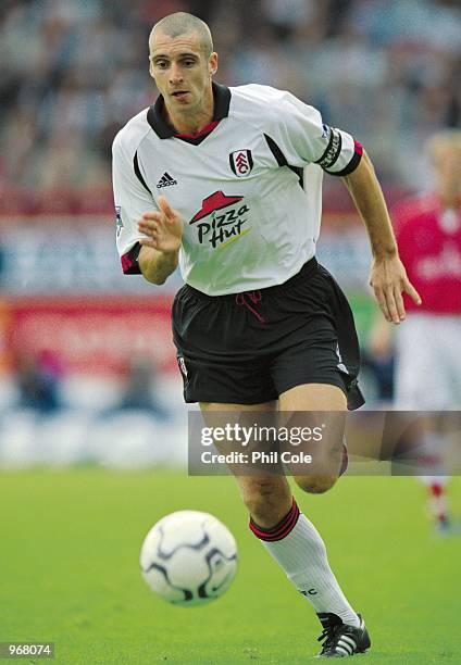 Andy Melville of Fulham runs with the ball during the FA Barclaycard Premiership match against Charlton Athletic played at The Valley, in London. The...