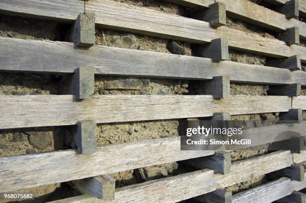 Compacted Timber 460 Wood Retaining Wall Stock Photos, High-Res Pictures, and Images ...