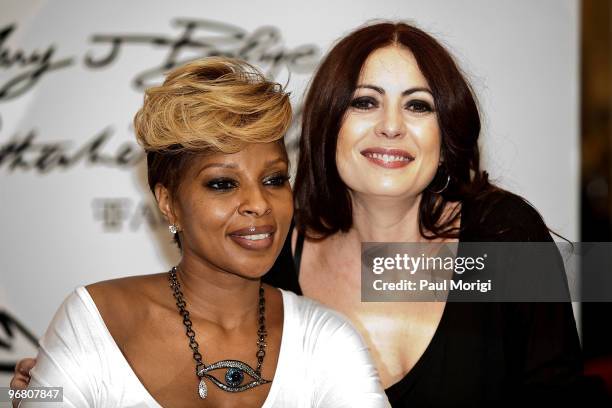 Singer Mary J Blige and designer Catherine Malandrino attend the debut of the limited edition FFAWN + Catherine Malandrino Capsule Collection...